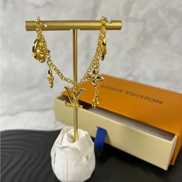 Louis Vuitton Gold Charm Bracelet with Iconic Motifs